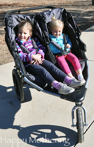 Zoe and Kaylee in the BOB Revolution Duallie Jogging stroller at the park