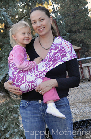 Chrystal wearing Kaylee in a Hotsling AP sling baby carrier