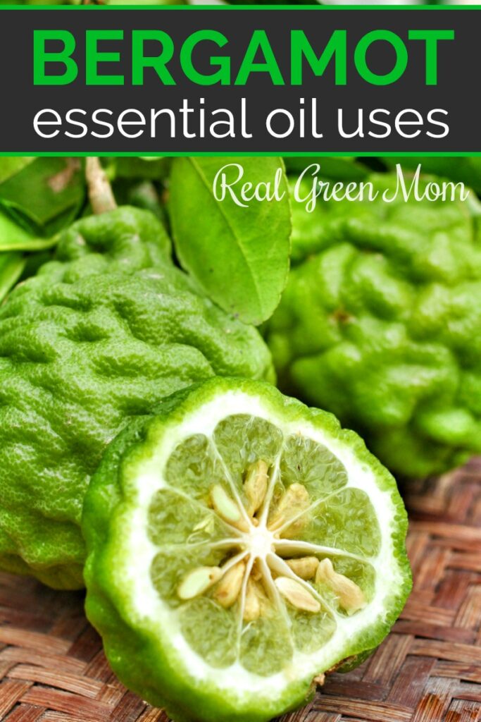 Several Bergamot fruits on a wood table