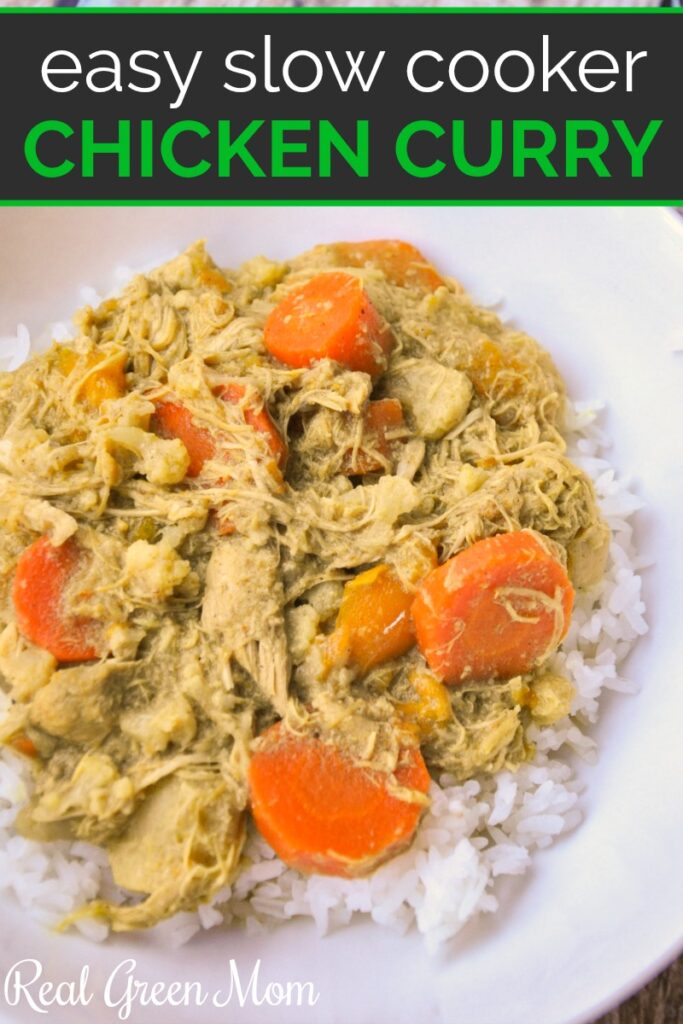 Chicken curry with carrots served over white rice in a white bowl