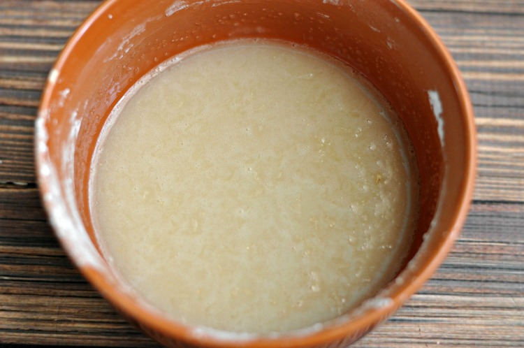 Lemon, sugar, arrowroot mixture in brown bowl