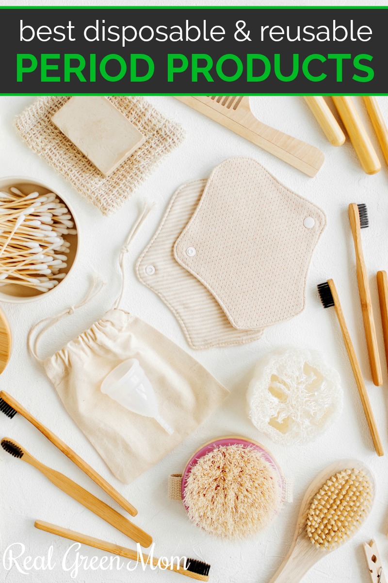 Cloth pads, menstrual cup and other natural beauty items spread out on a white counter