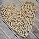 Digestive enzymes on a table in the shape of a heart
