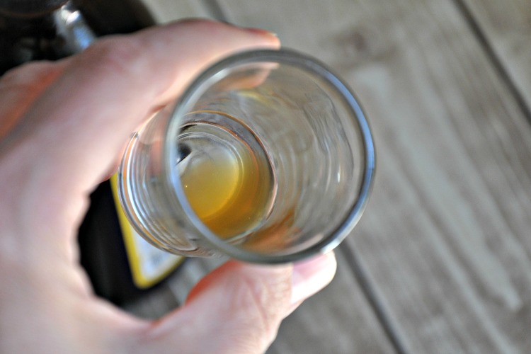Herbal bitters in a shot glass
