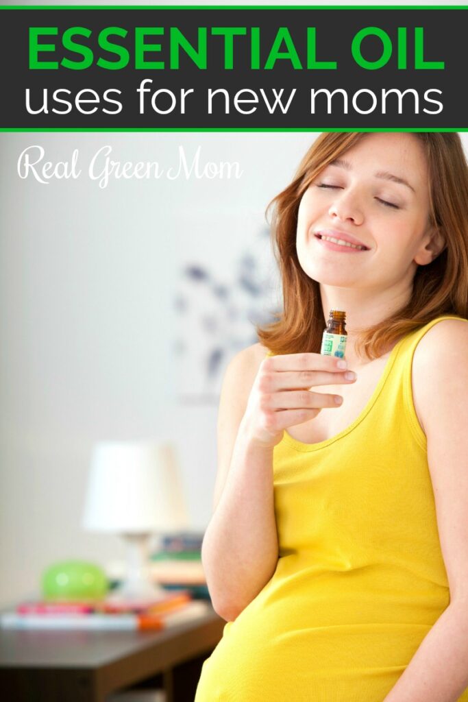 Pregnant woman in yellow tank top smelling bottle of essential oil and smiling