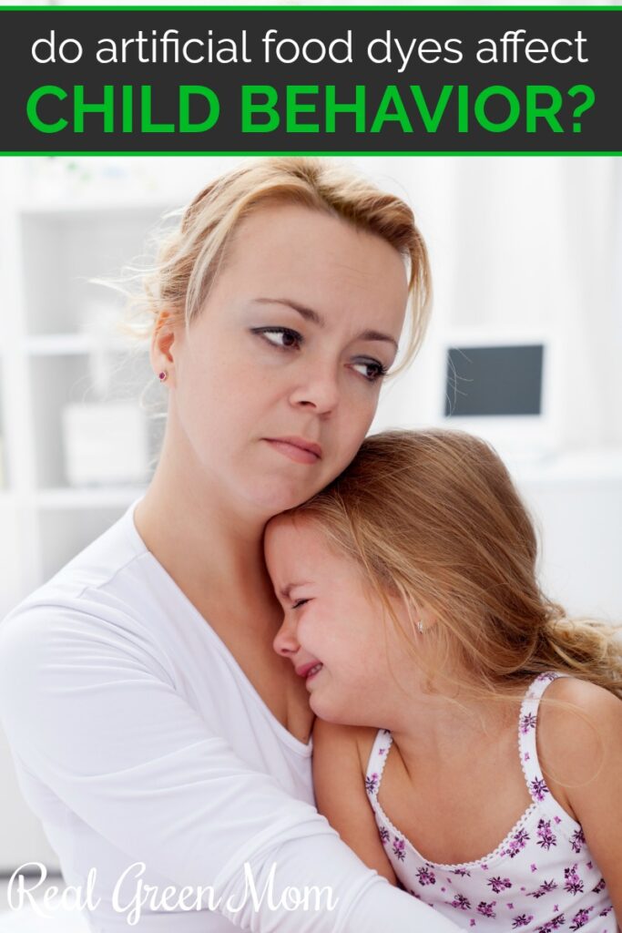 Mom hugging her daughter who is crying