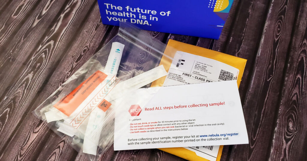 Contents of Nebula Genomics DNA test kit, including swabs, instructions and mailing envelope.