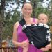 Chrystal wearing Kaylee in the Balboa Baby adjustable sling
